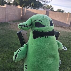 Disney Green Plush Monster Keychain with Black Embroidered Details